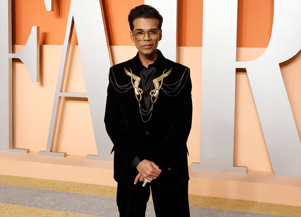 KARAN JOHAR IN CUSTOM GAURAV GUPTA COUTURE AT THE VANITY FAIR OSCAR PARTY