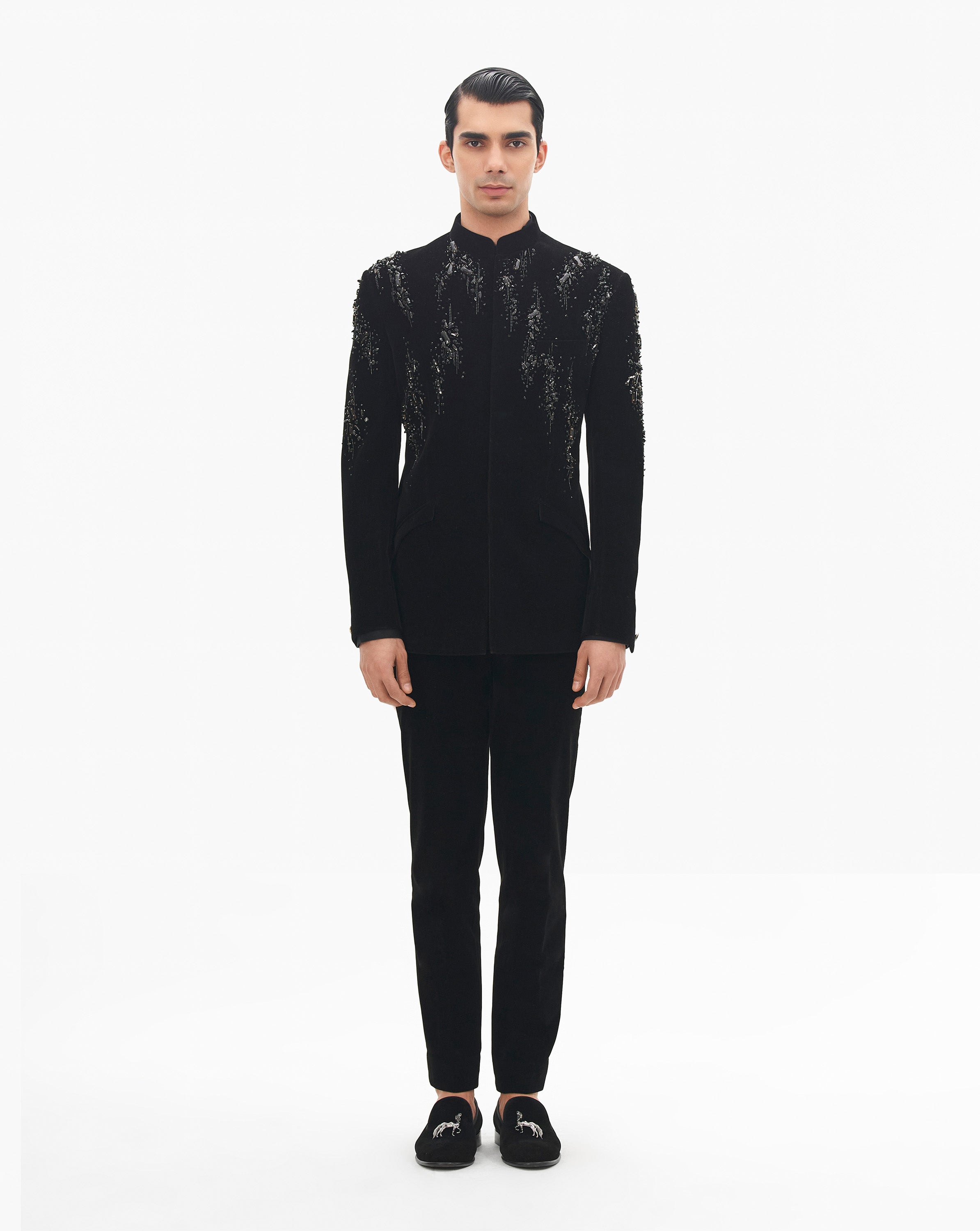 Model wearing a black embroidered  set by Gaurav Gupta