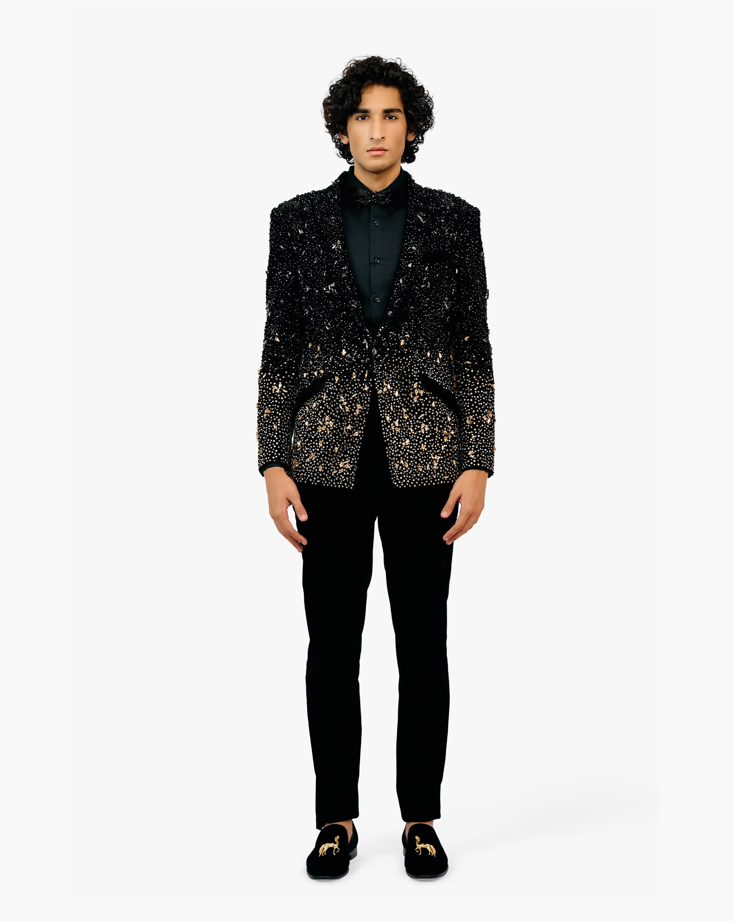 Model wearing black embroidered suit set by Gaurav Gupta
