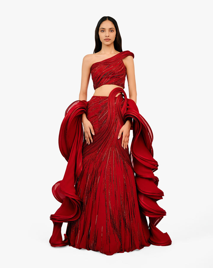 Red embellished one-shoulder lehenga with ruffled dupatta by Gaurav Gupta
