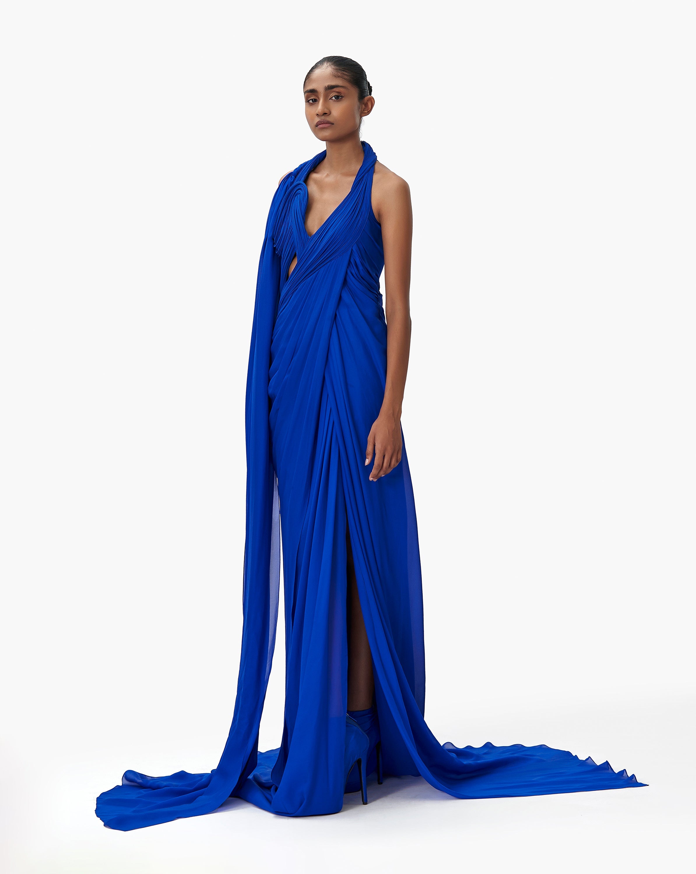 Woman in blue gown dress by Gaurav Gupta