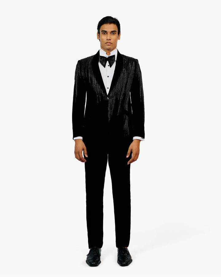 Model wearing black suit set by Gaurav Gupta