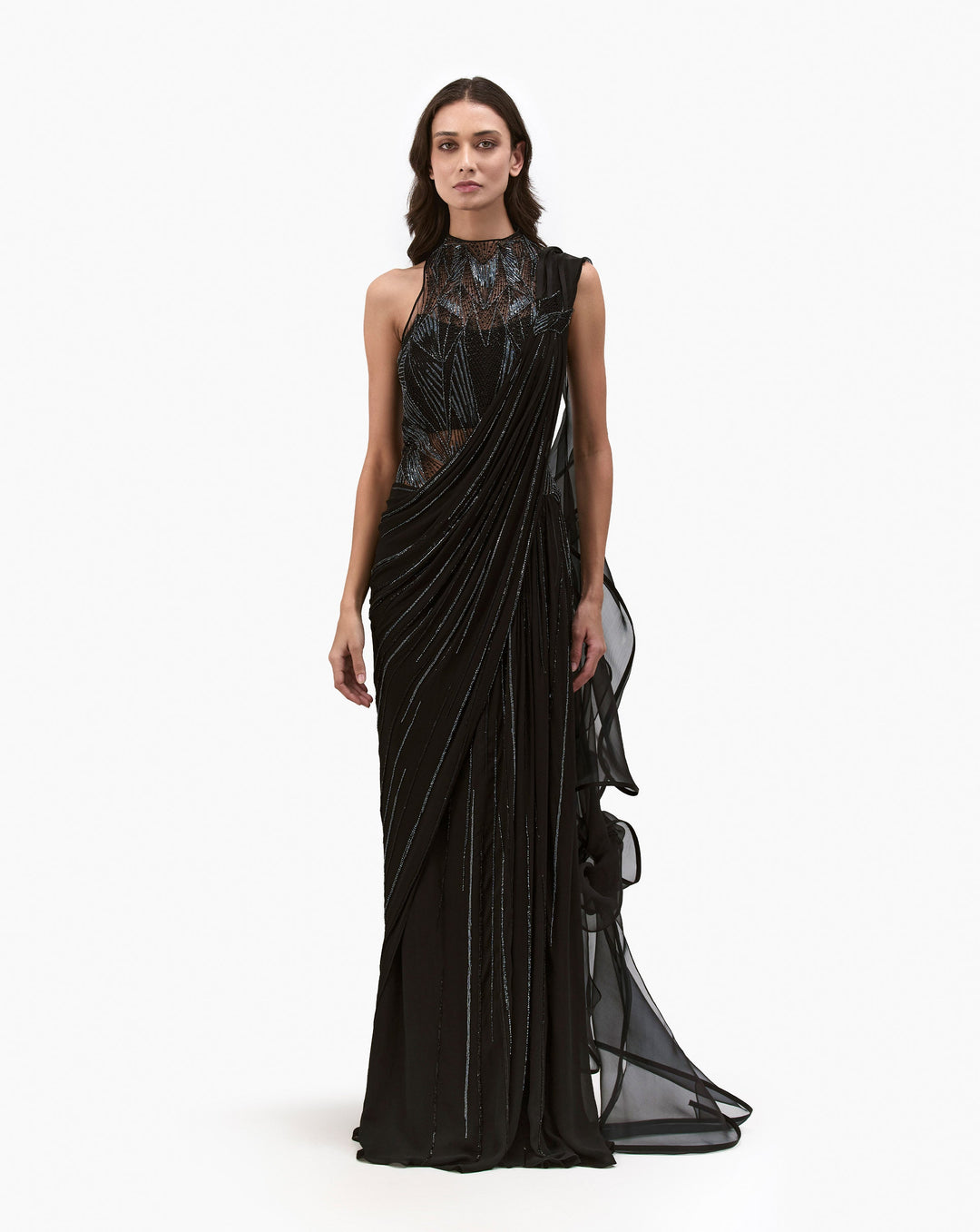 Front look of a model wearing a black dress by Gaurav Gupta