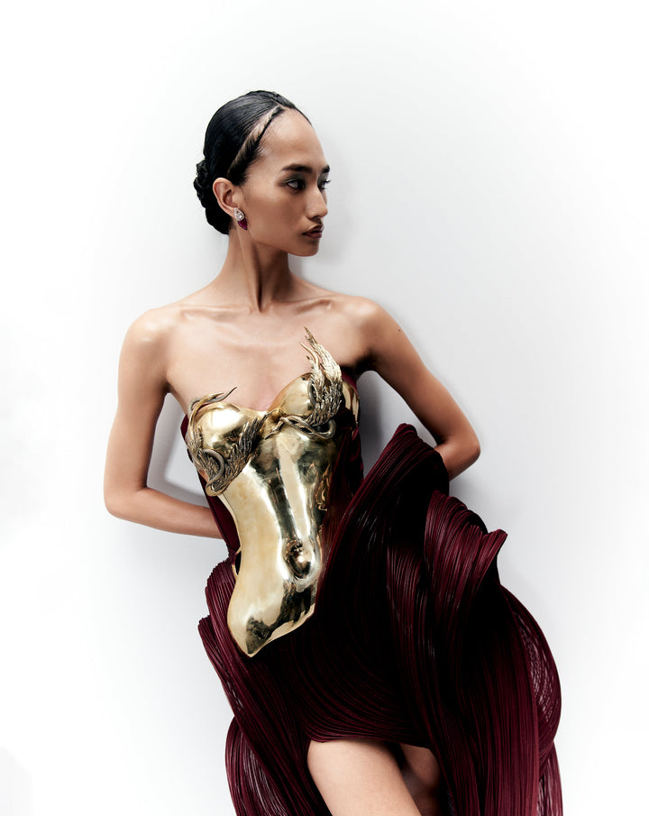 Metal corset top with draped skirt